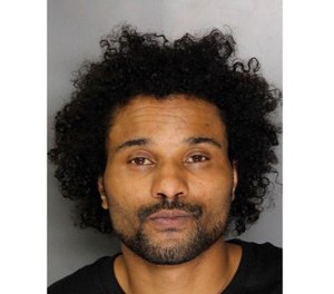 Anton Lemon Moore, 38, is accused of fatally shooting a Sacramento County Sheriff's deputy and wounding another deputy during a shootout in Rancho Cordova, Calif., the day before. Moore was wounded in the gun battle and was hospitalized.