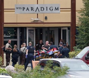 Four people were shot and wounded during the shooting on Wednesday, according to a city administrator. (Steve Apps/Wisconsin State Journal via AP)