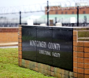 A sign sits in front of Montgomery County Correctional Facility on Tuesday, Sept. 25, 2018, in Eagleville, Pa.