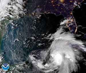 Hurricane Michael intensified into a Category 2 over warm Gulf of Mexico waters Tuesday amid fears it would strike Florida on Wednesday as an even stronger hurricane.