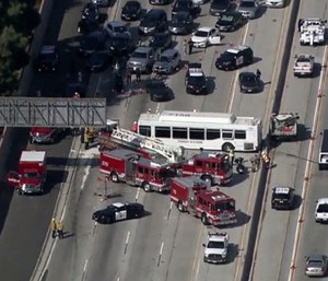 This aerial image made from video provided by KABC-TV shows the wreckage of a bus accident along Interstate 405 in Los Angeles. (Photo/AP)