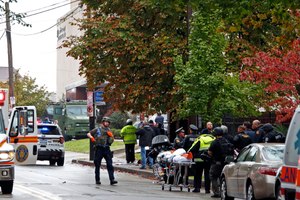 First responders surround the Tree of Life Synagogue in Pittsburgh, Pa., where a shooter opened fire Saturday, Oct. 27, 2018.