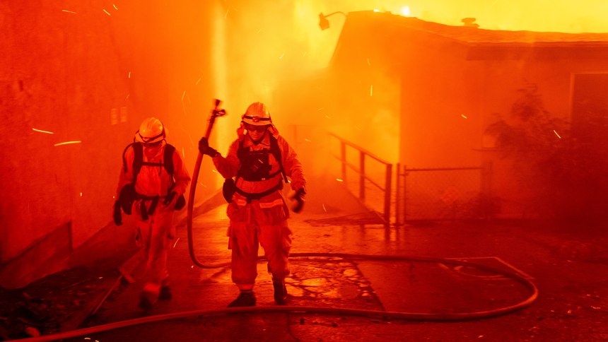 Firefighters battle the Camp Fire as it tears through Paradise, Calif., on Thursday, Nov. 8, 2018.