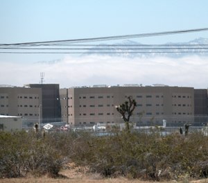 This Saturday April 20, 2019 photo shows the Adelanto Detention Center in Adelanto, Calif., a desert community northeast of Los Angeles.