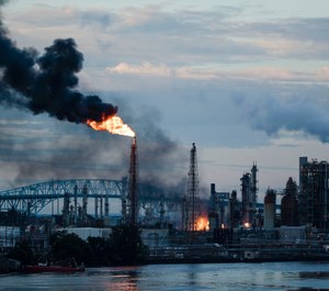 Flames and smoke emerge from the Philadelphia Energy Solutions Refining Complex in Philadelphia on June 21, 2019. (AP Photo/Matt Rourke)