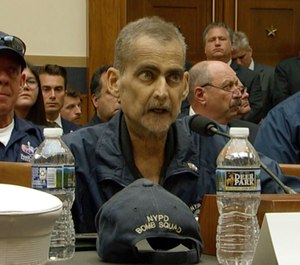 This still image taken from video shows Retired NYPD Detective and 9/11 Responder Luis Alvarez speaking during a hearing by the House Judiciary Committee as it considers permanent authorization of the Victim Compensation Fund, on Capitol Hill in Washington, Tuesday, June 11, 2019. (US Network Pool via AP, Pool)