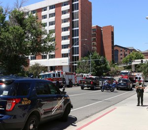 Rescue personnel respond to an explosion that damaged Argenta and Nye Halls on the University of Nevada, Reno.