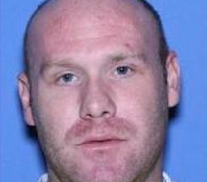 This undated photo provided by the U.S. Marshals shows Christopher Sanderson.