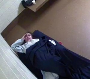 This July 31, 2018 photo from surveillance video shows Diana Sanchez, an inmate about to give birth alone in her Denver jail cell. (Killmer, Lane & Newman/Denver County Jail via AP)