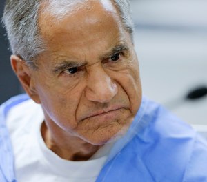FILE - In this Wednesday, Feb. 10, 2016, file photo, Sirhan Sirhan reacts during a parole hearing at the Richard J. Donovan Correctional Facility in San Diego. Sirhan, Sen. Robert F. Kennedy’s assassin, is hospitalized in stable condition after being stabbed by a fellow inmate at a Southern California prison, Friday, Aug. 30, 2019.