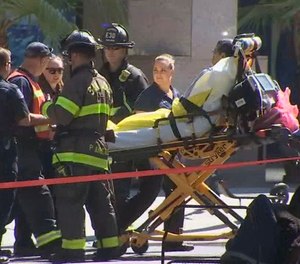 Emergency personnel respond to a hazmat incident at the Fairmont Hotel. (Photo/KTVU via AP)