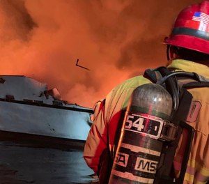 In this photo provided by the Ventura County Fire Department, VCFD firefighters respond to a boat fire off the coast of southern California. (Photo/Ventura County Fire Department via AP)