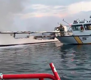 Five victims have been found but not recovered due to unsafe conditions under the boat, which sank in about 60 feet of water.