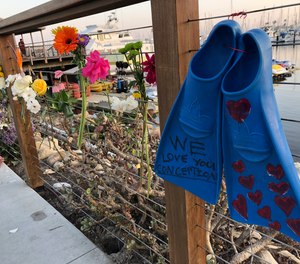 A memorial outside Truth Aquatics for the victims of the Conception boat fire.