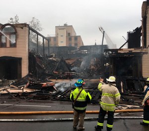 Firefighters in Duluth, Minn., battle a blaze at the Adas Israel Congregation. (Dan Kraker/Minnesota Public Radio via AP)
