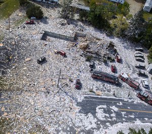 An aerial view of the devastation after an explosion at the Life Enrichment Advancing People (LEAP) building, in Farmington, Maine, killed one firefighter and injured multiple other people.