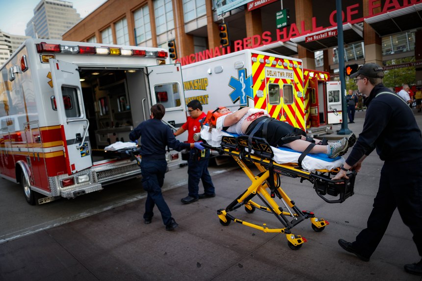 Emergency medical personnel prepare to load a simulated victim into an ambulance during a mass casualty training exercise, Thursday, Sept. 19, 2019, in Cincinnati.