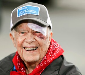 In this Monday, Oct. 7, 2019 file photo, Former President Jimmy Carter answers questions during a news conference at a Habitat for Humanity project, in Nashville, Tenn. Carter has been hospitalized after an another fall at his home in Plains, Ga. A statement from The Carter Center says Carter suffered