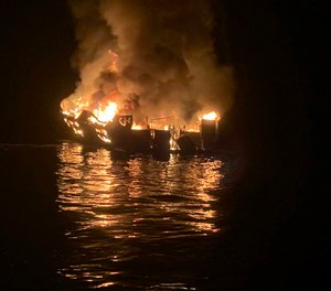 In this Sept. 2, 2019, file photo provided by the Santa Barbara County Fire Department, the dive boat Conception is engulfed in flames after a deadly fire broke out aboard the commercial scuba diving vessel off the Southern California Coast. The widow of Justin Dignam, one of the 34 people who died in the fire, has filed a lawsuit against the boat's owners, making it the first claim from one of the 34 victims' families. (Photo/Santa Barbara County Fire Department via AP, File)