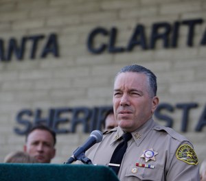 Los Angeles Sheriff Alex Villanueva expresses his condolences for the victims of the shooting at Saugus High School at a news conference at the station Santa Clarita, Calif., Friday, Nov. 15, 2019. (AP Photo/Damian Dovarganes)