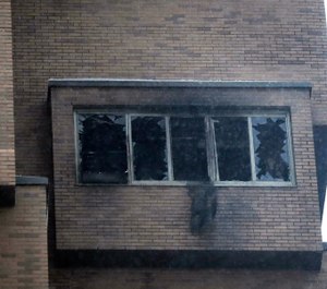 Broken windows and damage remain after a deadly fire at the high-rise apartment building on Nov. 27, 2019, in Minneapolis. (David Joles/Star Tribune via AP)