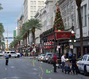 New Orleans police investigate the scene of a shooting Sunday, Dec. 1, 2019, on the edge of the city's famed French Quarter in New Orleans. (Photo/Max Becherer, The Advocate via AP)