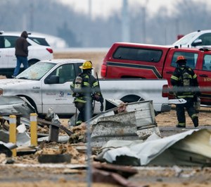 Authorities respond after a partial building collapse at Beechcraft aircraft manufacturing facility in Wichita, Kan., Friday, Dec. 27, 2019. More than a dozen people were injured Friday when a nitrogen line ruptured at the facility, causing part of the building to collapse, authorities said. (Photo/Travis Heying, The Wichita Eagle via AP)