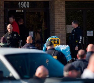 Authorities continue to work the scene of a fatal shooting where multiple people were shot at a church, Sunday, Dec. 29, 2019, in White Settlement, Texas. (Juan Figueroa/The Dallas Morning News via AP)