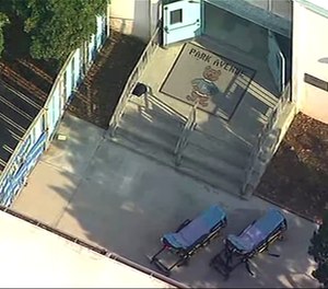 This aerial photo provided by KABC shows Park Avenue Elementary School in Cudahy, Calif., on Tuesday, Jan. 14, 2020. Fuel apparently dumped by an aircraft returning to Los Angeles International Airport fell onto an elementary school playground Tuesday, fire officials said.