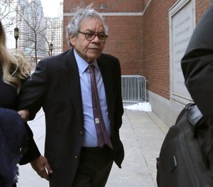 Insys Therapeutics founder John Kapoor arrives for sentencing at federal court on Thursday, Jan. 23, 2020, in Boston. Kapoor was convicted in a bribery and kickback scheme that prosecutors said helped fuel the opioid crisis. He and others in the company were accused of paying millions of dollars in bribes to doctors across the nation to prescribe the company's highly addictive fentanyl spray, known as Subsys. (AP Photo/Charles Krupa)