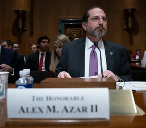 In this Feb. 13, 2020 file photo, Secretary of Health and Human Services Alex Azar testifies on Capitol Hill in Washington. Democrats controlling the House wrote HHS Secretary Alex Azar earlier this month to request funds to help speed development of a coronavirus vaccine, expand laboratory capacity, and beef up screening efforts at U.S. entry points. Azar is slated to testify before the Senate Appropriations Committee on Tuesday, and the U.S. response to the outbreak is sure to be a major topic.