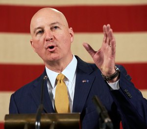 Nebraska Gov. Pete Ricketts speaks during a news conference in Lincoln, Neb., Monday, March 16, 2020