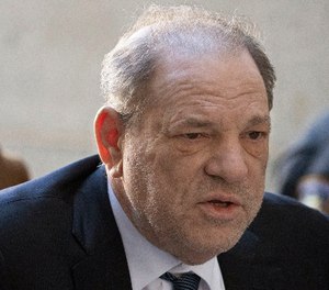 Weinstein tested positive for COVID-19 at a state prison in New York while serving a 23-year sentence for rape and sexual assault. (AP Photo/Mark Lennihan)