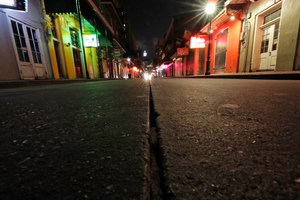 A view of the nearly deserted scene on Bourbon Street. Like many cities around the country, New Orleans is currently under a shelter-in-place order as it grapples with a growing number of coronavirus cases. Image: AP Photo/Gerald Herbert