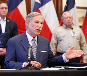 Texas Governor Greg Abbott discusses the state's coronavirus response during a press conference in Austin on March 29, 2020. (Tom Fox/The Dallas Morning News via AP, Pool)