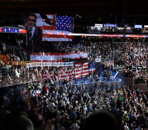 In this July 26, 2016, file photo Timmy Kelly sings the national anthem before the start of the second day of the Democratic National Convention at the Wells Fargo Arena in Philadelphia.