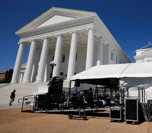 The Virginia House of Delegates meet inside a large tent during the veto session at the Virginia State Capitol in Richmond, Va., Wednesday, April 22, 2020. (Bob Brown/Richmond Times-Dispatch, Pool)