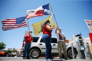 Protesters attend a Safely Open Texas Now rally Saturday, April 25, 2020, across the street from the El Paso County Court House in El Paso, Texas, during the coronavirus outbreak. The protesters demanded elected officials safely reopen the State of Texas, the County of El Paso and the city of El Paso for business. Image: Briana Sanchez/The El Paso Times via AP