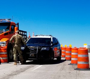 Gov. Michelle Lujan Grisham invoked the state's Riot Control Act on May 1 as she sealed off all roads to nonessential traffic in one of the largest communities bordering the Navajo Nation, where a surging coronavirus outbreak has already prompted widespread restrictions and weekend lockdowns. (Patrick Sandoval via AP)