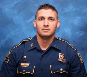 A photo provided by the Louisiana State Police shows Trooper George Baker, 33, who died Sunday, May 24, 2020, days after he was struck by another law enforcement vehicle as he aided in a pursuit of two suspects. (Louisiana State Police via AP)