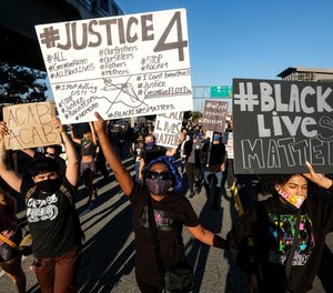 Demonstrators shut down the Hollywood Freeway in Los Angeles on Wednesday, May 27, 2020, during a protest about the death of George Floyd in police custody in Minneapolis earlier in the week.