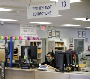 A Department of Motor Vehicle office Thursday, May 28, 2020, in Newhall, Calif.