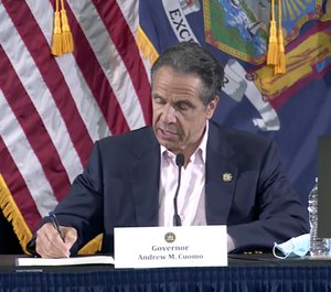 New York Gov. Andrew Cuomo signed a bill on Saturday giving death benefits to the families of certain government workers who were killed by COVID-19. (Photo/Office of Governor Andrew M. Cuomo via AP)