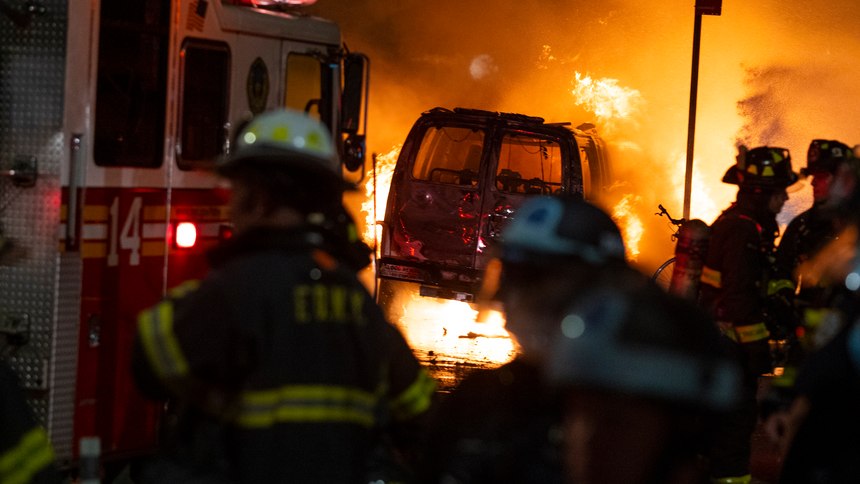 A vehicle burns near New York's Union Square, Saturday, May 30, 2020, during a demonstration against the death of George Floyd, a black man who died in Minneapolis police custody on May 25.