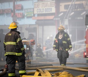 Firefighters battle a blaze in Philadelphia, Monday, June 1, 2020 in the aftermath of protest and unrest in reaction to the death of George Floyd. Floyd died after being restrained by Minneapolis police officers on May 25.