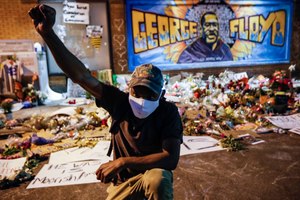 Protesters gather at a memorial for George Floyd where he died outside Cup Foods on East 38th Street and Chicago Avenue, Monday, June 1, 2020, in Minneapolis. Image: AP Photo/John Minchillo