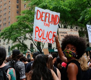 Protesters march Saturday, June 6, 2020, in New York. Demonstrations continue across the United States in protest of racism and police brutality, sparked by the May 25 death of George Floyd in police custody in Minneapolis.