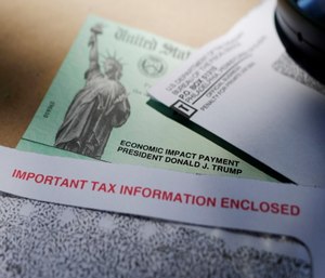 President Donald Trump's name is seen on a stimulus check issued by the IRS to help combat the adverse economic effects of the COVID-19 outbreak.
