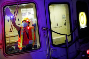 A contractor cleans a subway car at the 96th Street station to control the spread of COVID-19, Thursday, July 2, 2020, in New York. Mass transit systems around the world have taken unprecedented — and expensive — steps to curb the spread of the coronavirus. Image: AP Photo/John Minchillo