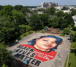 A ground mural depicting a portrait of Breonna Taylor is seen at Chambers Park, Monday, July 6, 2020, in Annapolis, Md.